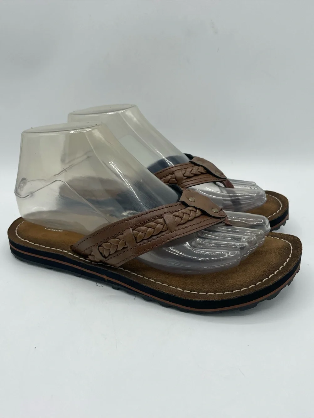Clarks Collection Women’s Brown Braided Leather Toe-Post Sandals.